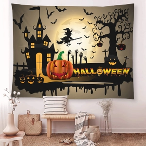 Close-up of Halloween tapestry with pumpkin, castle and bats hanging on a white wall