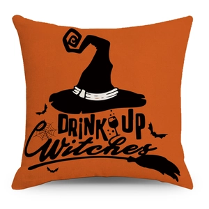 Orange Halloween pillow cover featuring black witch hat and Drink Up Witches text
