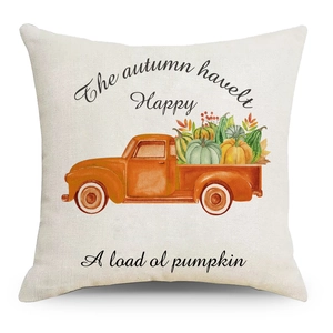 Detailed macro view of linen fabric texture featuring a vintage orange pickup truck and pumpkins