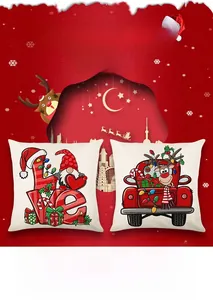 Detail of red Christmas pillow covers featuring gnome and festive truck prints