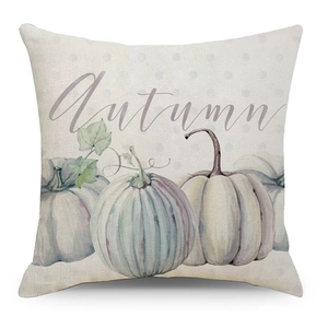 Detailed view of autumn pumpkin print and scripts on linen textured cushion cover