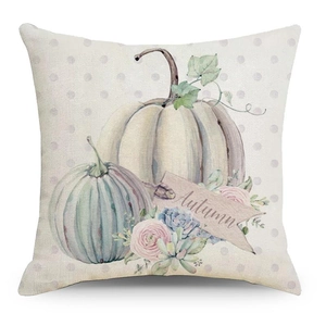 Close-up of autumn pumpkin pillow case with white and green pumpkins and autumn text