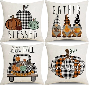 Detailed set of four autumn harvest throw pillow covers with pumpkin gnome motifs