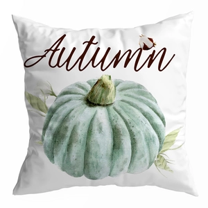 Close-up of soft white pillow cover with watercolor green pumpkin and Autumn text