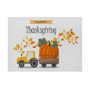 Linen Thanksgiving placemat with yellow tractor and large pumpkin print for dining tables