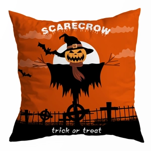 Detail of Halloween pumpkin scarecrow pillowcase with trick or treat text on peach skin fabric