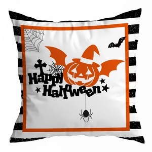 Macro detail of Halloween pillowcase featuring orange pumpkin and Happy Halloween text