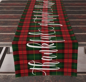Detail of red and green plaid table runner with Thankful grateful blessed calligraphy