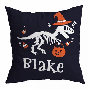 Detail of Halloween pillowcase with dinosaur skeleton, wizard hat and Blake custom name