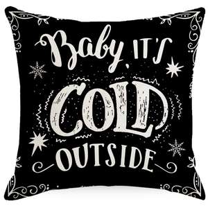 Christmas cushion cover with snowflake and Baby It's Cold Outside text on black linen