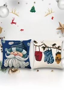 Detail der Weihnachtskissenbezüge aus Leinen mit Weihnachtsmann- und Handschuhmuster