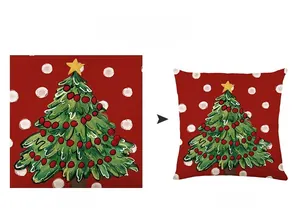 Detail of red Christmas pillowcase with white dots and green hand-drawn tree print