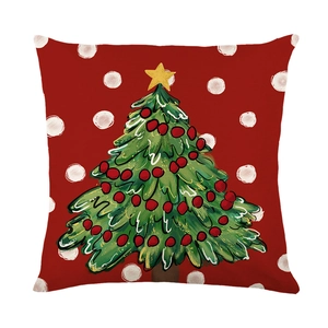 Christmas pillowcase with red polka dots and a hand-painted green Christmas tree on linen