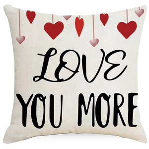 Linen Valentine cushion cover with LOVE YOU MORE text and red hanging hearts