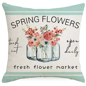 Spring flowers pillow cover with floral watercolor design on linen-style fabric