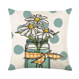 Square pillow cover with blue dots and daisy flower illustration on white linen fabric