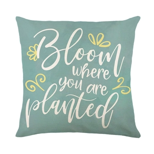 Blue-green linen pillow cover featuring Bloom where you are planted floral print