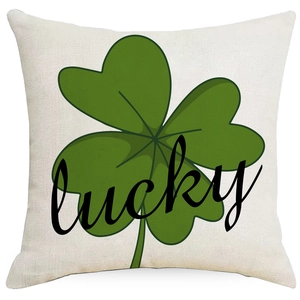 Linen Saint Patrick's Day pillow cover with green clover and lucky text on white background