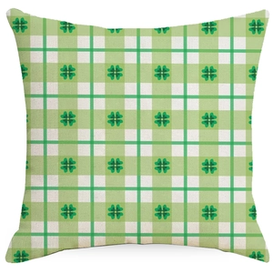 Green and white gingham pillow cover with shamrock patterns for St. Patrick's Day