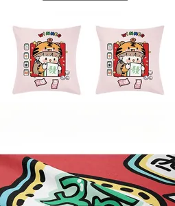 Detail view of double-sided printed pillow covers with festive cartoon graphics and soft fabric
