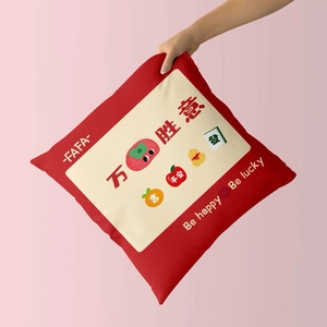 Close-up of a festive red Chinese cushion featuring traditional lucky motifs and embroidery