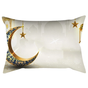 Detail of golden moon and lantern pattern on rectangular Ramadan lumbar pillow cover