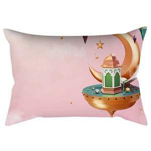 Detail of peach skin velvet waist pillow with golden moon and green Ramadan lantern print