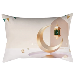 Close-up of golden crescent moon and Arabic lantern print on peach skin pillowcase