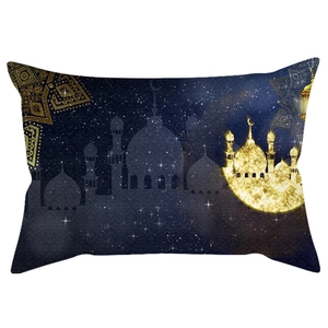Detail of blue velvet lumbar pillow cover with golden crescent moon and mosque print
