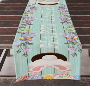 Detail of Easter table runner with Happy Easter lettering, eggs and floral patterns
