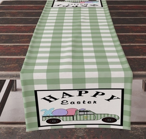 Easter table runner detail with green gingham, vintage truck, eggs, and Happy Easter text