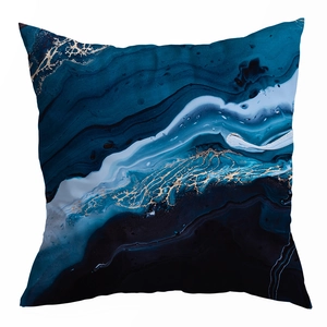 Blue abstract marble print pillow case with gold vein texture on soft peach skin fabric