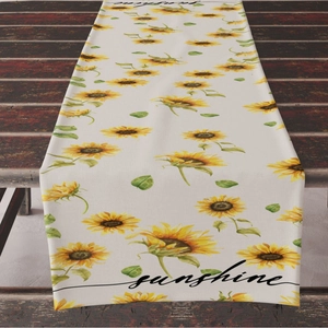 Linen table runner featuring vibrant sunflowers and sunshine text on rustic wood