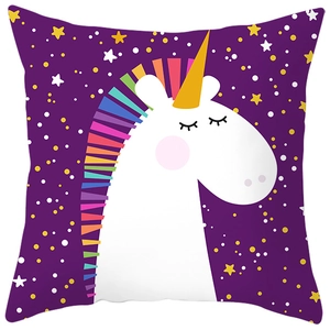 Close-up of peach skin pillowcase featuring colorful unicorn and starry sky print