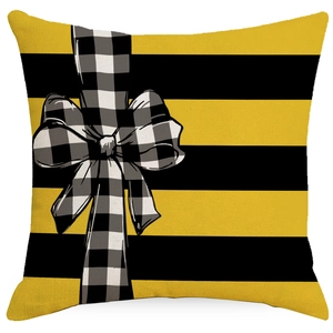 Housse de coussin en lin à rayures jaunes et noires avec motif de nœud à carreaux