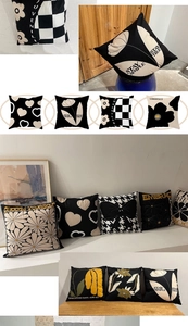 Detail of floral and checkered black and white decorative cushion covers in cotton linen