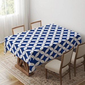 Detail view of rectangular tablecloth with blue and white geometric mandala pattern