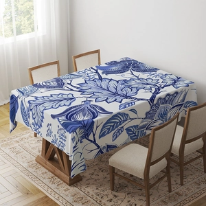 Bohemian blue floral rectangular tablecloth on a wooden table with rustic home decor