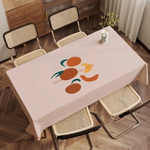 Detailed texture of pink velvet tablecloth featuring orange illustration and modern text