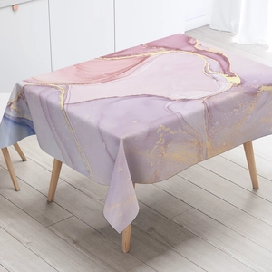 Close-up of pink and purple marble texture tablecloth with elegant golden glitter edges