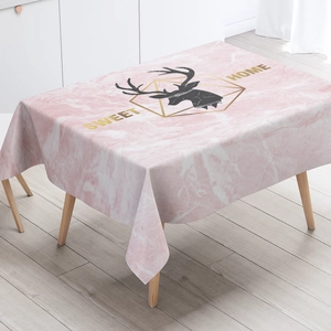 Detail of pink marble pattern tablecloth with deer silhouette and sweet home text