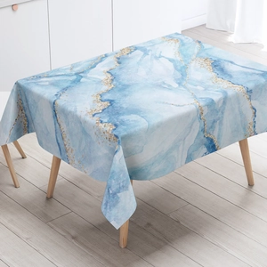 Detail of blue marble pattern tablecloth with gold foil accents and premium draping