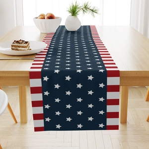 Close-up of linen table runner featuring American flag stars and stripes pattern