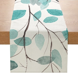 Texture détaillée du chemin de table en lin avec élégant imprimé de feuilles
