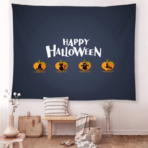 Detail of Happy Halloween tapestry with pumpkin silhouettes on dark blue fabric