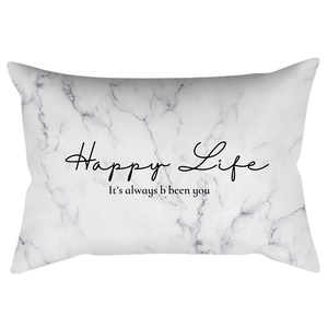 Detail of marble pattern pillowcase featuring Happy Life and It is always been you text