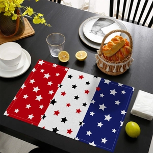 Independence Day placemat with stars on red, white, and blue stripes over black wood