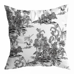 Close-up of Toile de Jouy pillow cover with black and white tropical animal prints