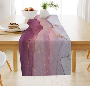 Detail of purple marble table runner with golden ink texture on a light wood table