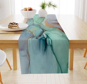 Detail of marble pattern table runner with turquoise blue and gold fluid art texture